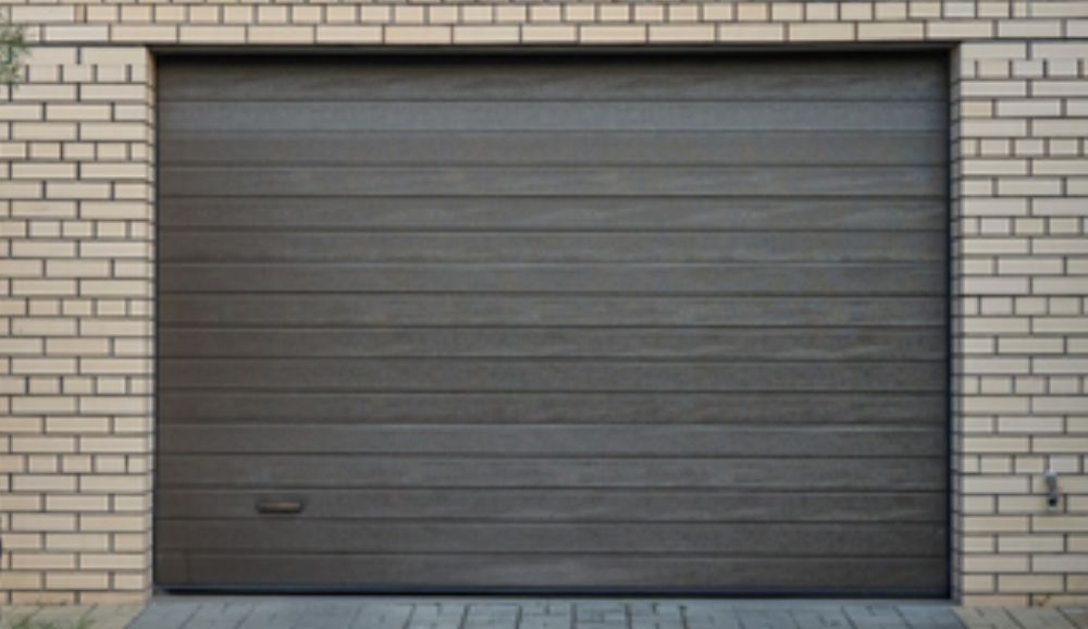 porte garage enroulable a reparer